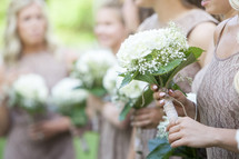 bridesmaids holding bouquets 