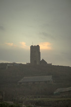 a church on a hilltop 
