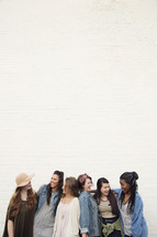 A group of female friends talking and laughing.