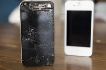 iPhone and iPhone with a cracked screen