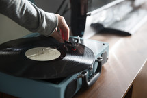 a recording player playing a record 