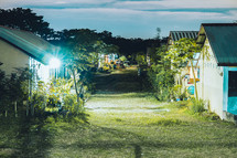 lights on village houses at night 