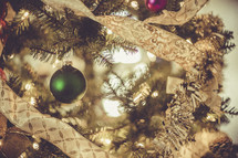 Ornaments on a decorated Christmas tree. 