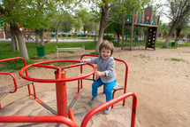 toddler on a playground 