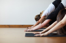 stretching in a yoga studio 