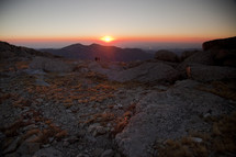 sunset behind a mountain 