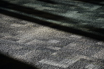 shadows and sunlight on carpet 