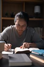 Woman studying a Bible