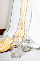 glass jars and striped curtains 