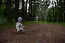 portrait of a toddler boy outdoors 