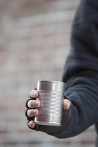 beggar with tin can 