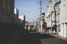 buildings lining a narrow street 