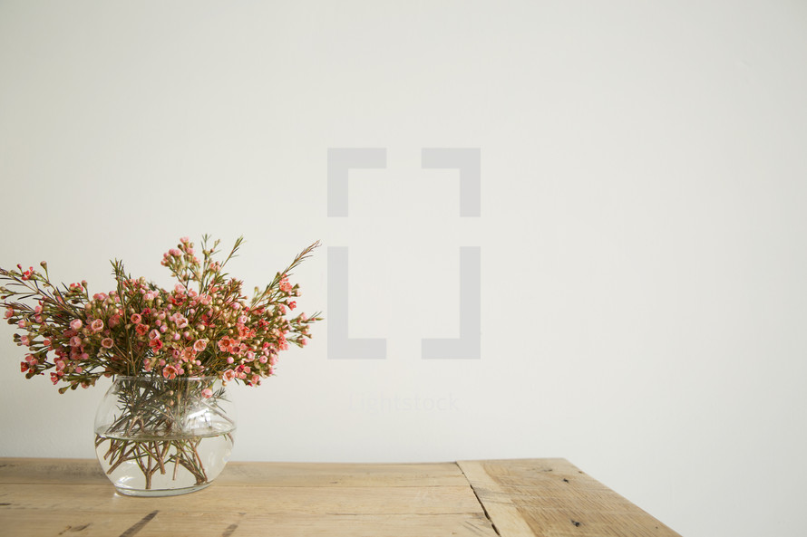 flowers in a vase on a table 