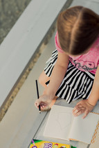 Young elementary age girl, drawing a house, church, color, art, activities, school, child