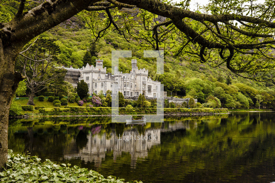 chateau and reflection in water 