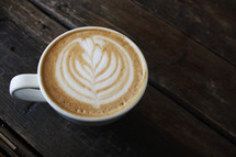 leaf shape in creamer in coffee 