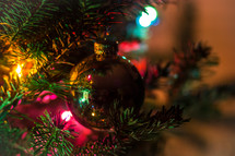 ornaments and lights on a Christmas tree 