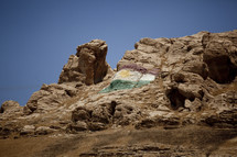 Iraqi flag painted on a cliff wall 