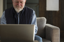 man looking at a computer screen 