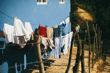 clothes on a clothes line and barbed wire 