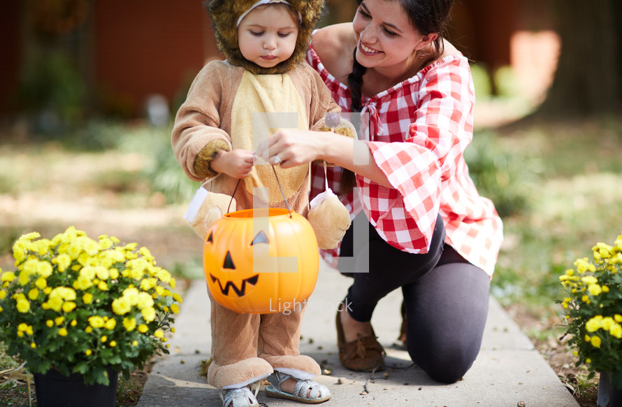 mother and child trick-or-treating 