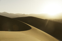desert sand dunes at sunset 