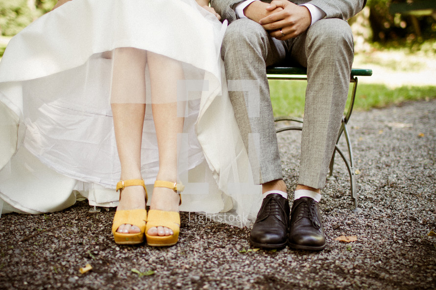feet of a bride and groom 