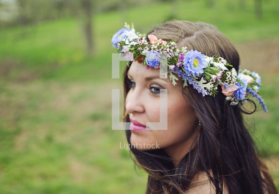woman wearing crown of flowers 