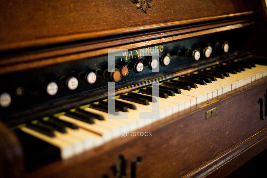 Old wooden Mannborg piano.
