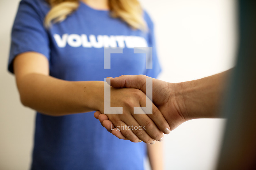volunteer shaking hands 