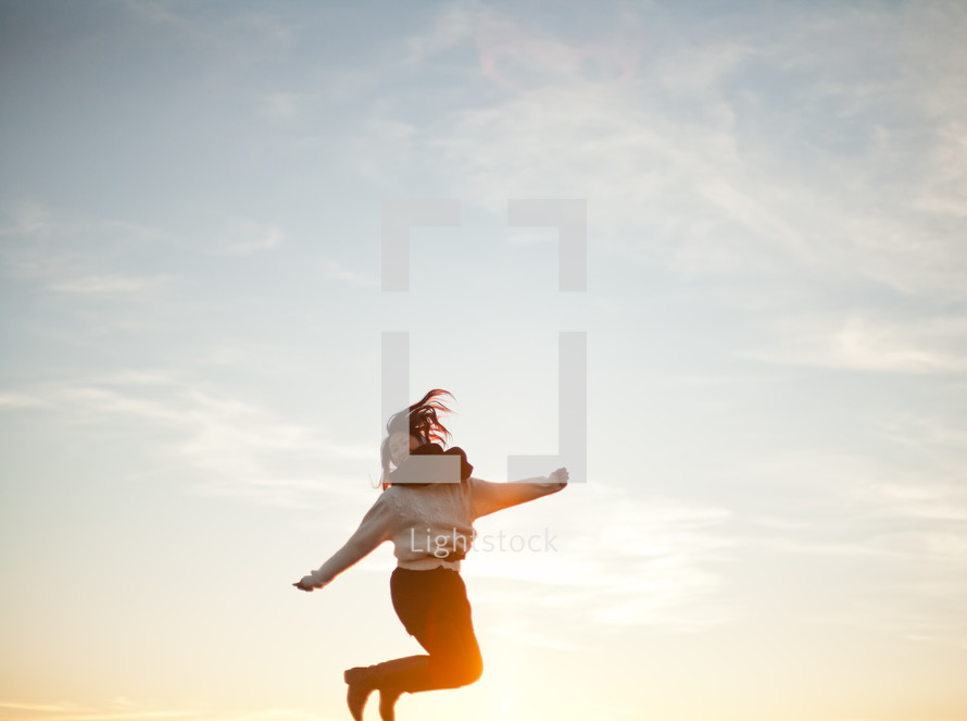 A woman jumping in the air