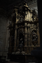 ornate sculpture inside a cathedral 