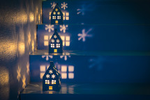house shaped luminaries on steps at Christmas 