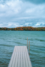 dock over a lake in fall 