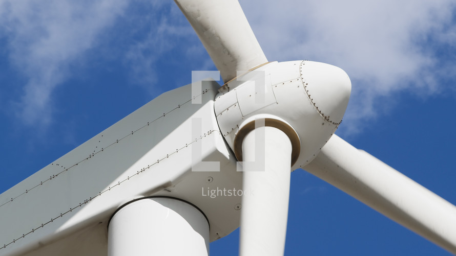 High power Wind turbine with clear sky behind it