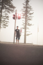 surfer at a crosswalk