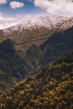 Snowy mountains and autumn colors