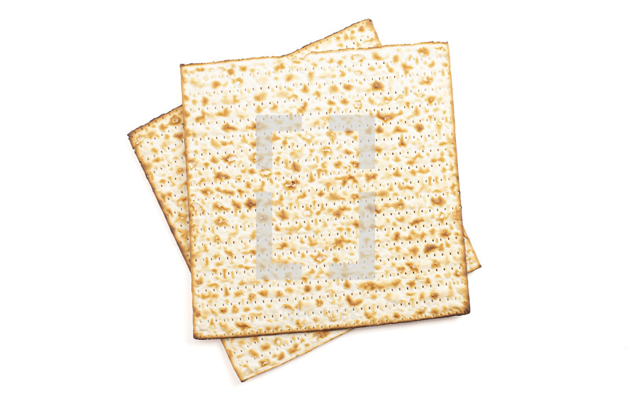 Pieces of Matzah Unleavened Bread Isolated on a White Background