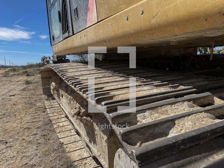 Close up of a large excavator at a construction site