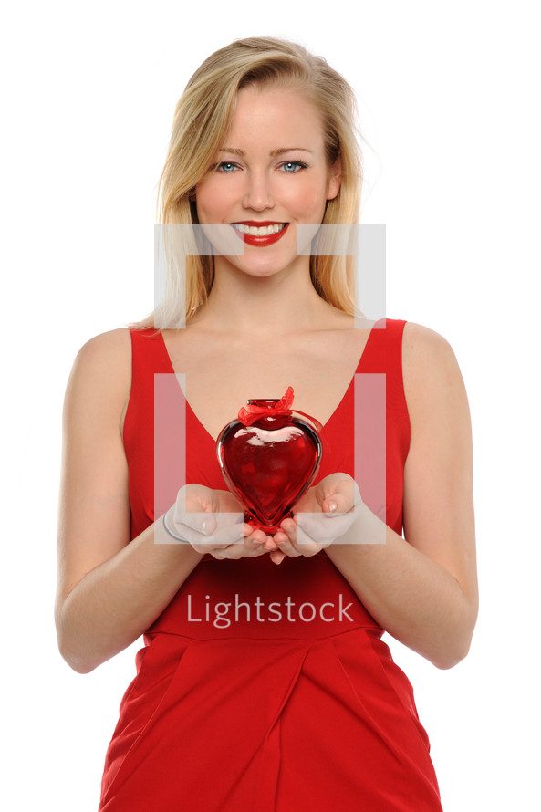 woman in a red dress holding a Valentine's gift 