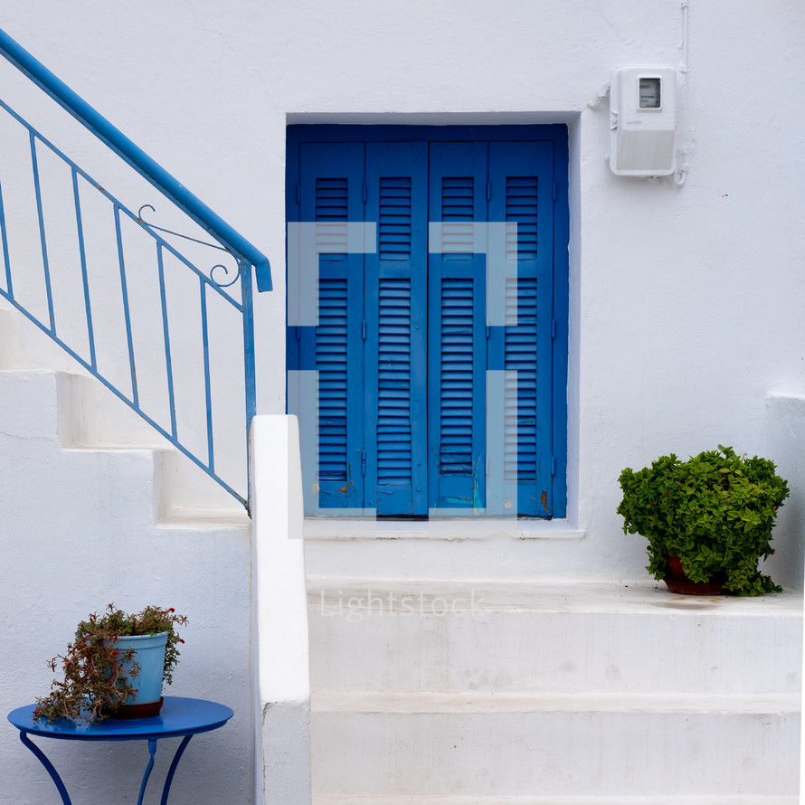 white steps and blue doors 