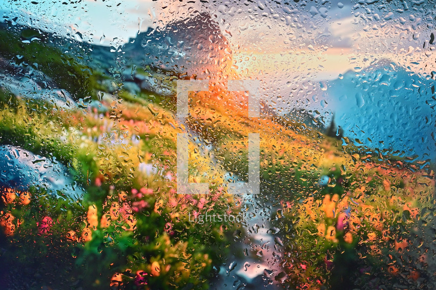 Abstract Mountain Peak Behind Glass Window With Rain Drops