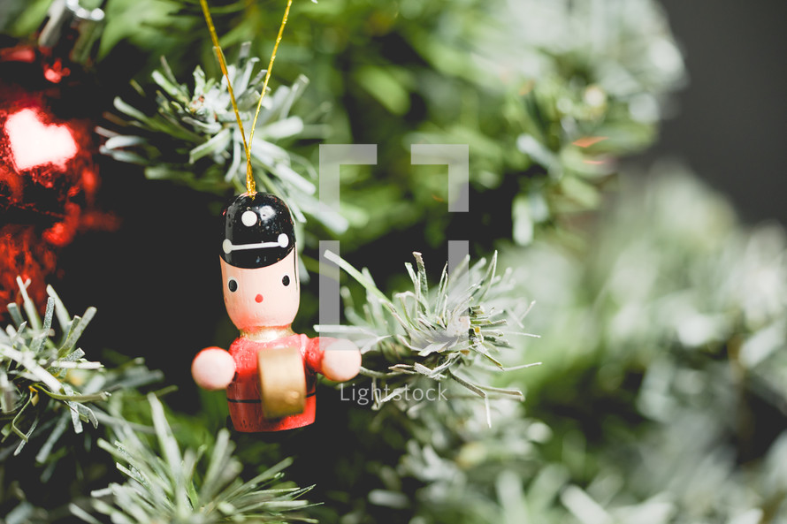 little drummer boy ornament on a Christmas tree 