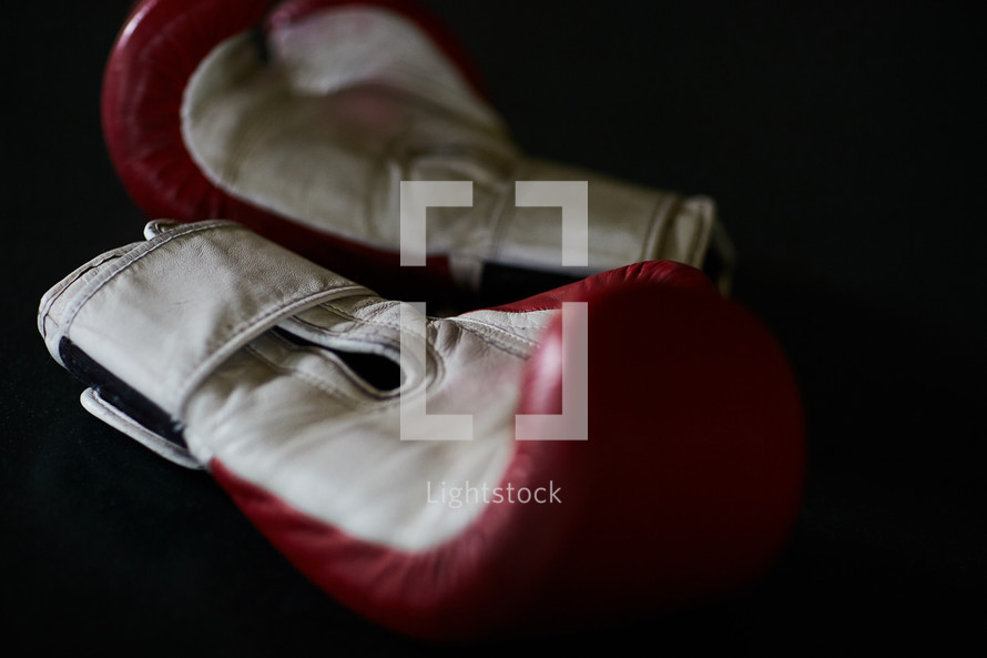 boxing gloves on a mat