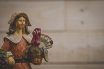 pilgrim and turkey figurine 