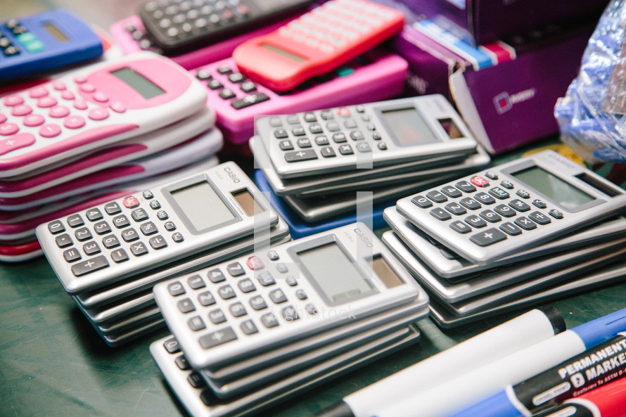 stack of calculators 