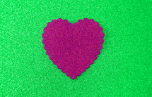pink heart on green 