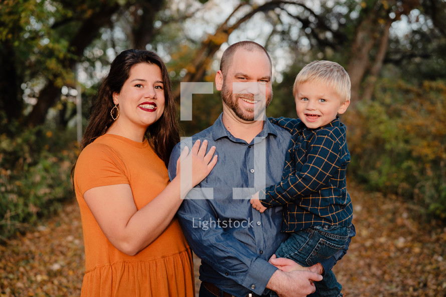 family portrait outdoors in autumn 