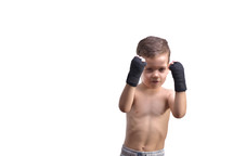 Little boy boxing, shows his fists, isolated on white