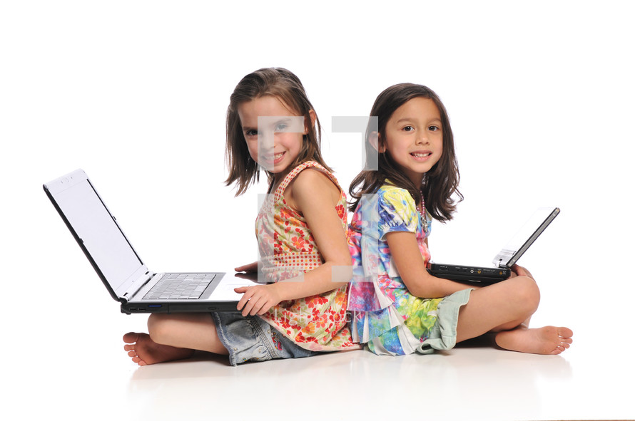 girl children on laptops 